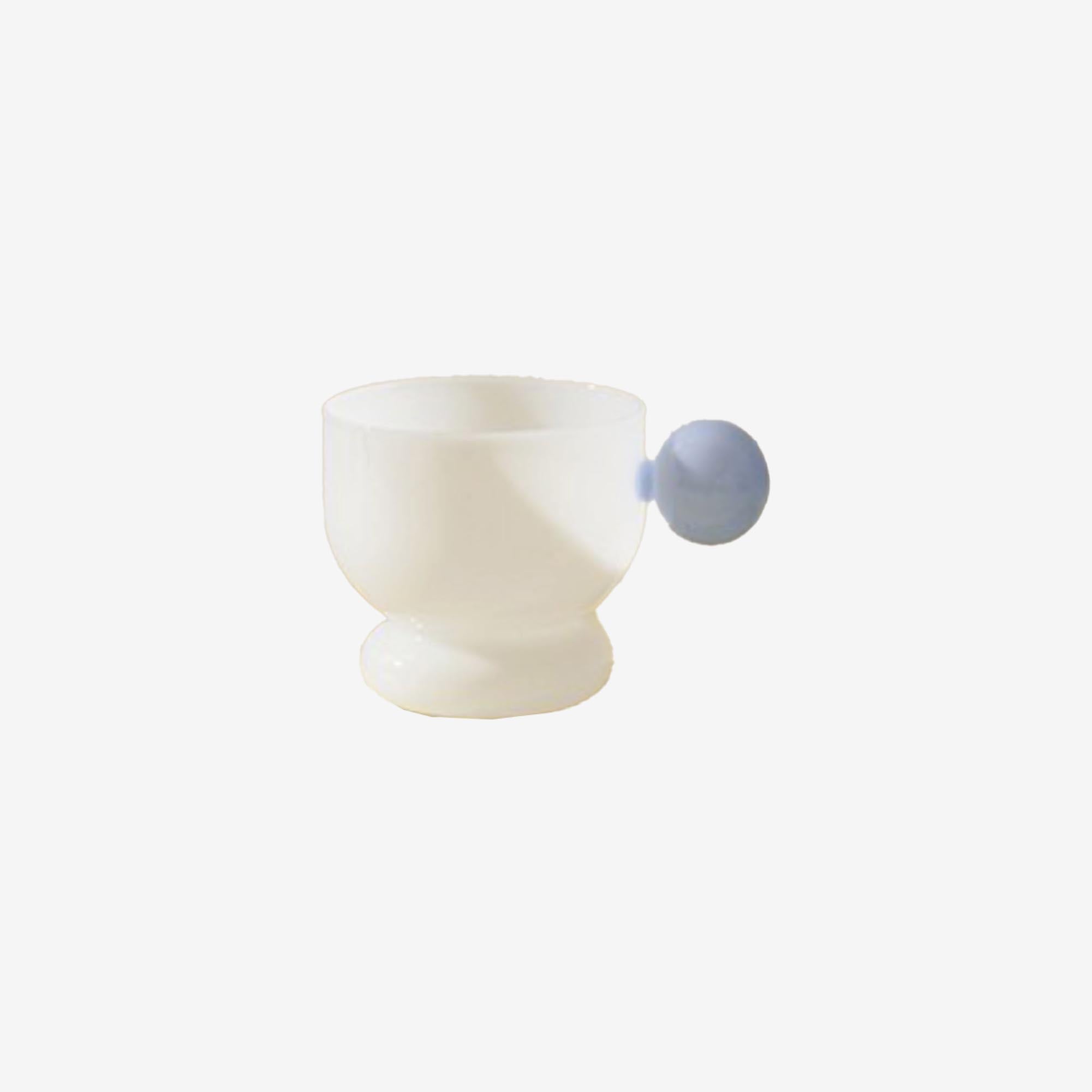 White Glass with Blue Bead Handle